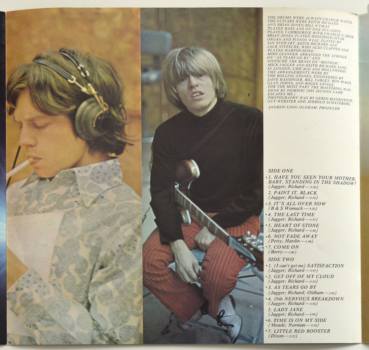 Double photo layout from the 1974 German Big Hits booklet showing Mick Jagger in studio with headphones and cigarette, and Brian Jones seated with a guitar and striped pants, alongside printed tracklisting and production notes.